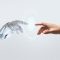 Technology meets humanity background, modern remake of The Creation of Adam